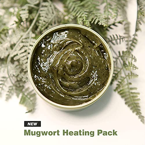 Open jar of GRAYMELIN Mugwort Heating Pack displaying the herbal clay texture with mugwort leaf powder.