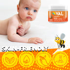 Applying VAL baby chest rub on the soles of infant feet for bedtime relaxation