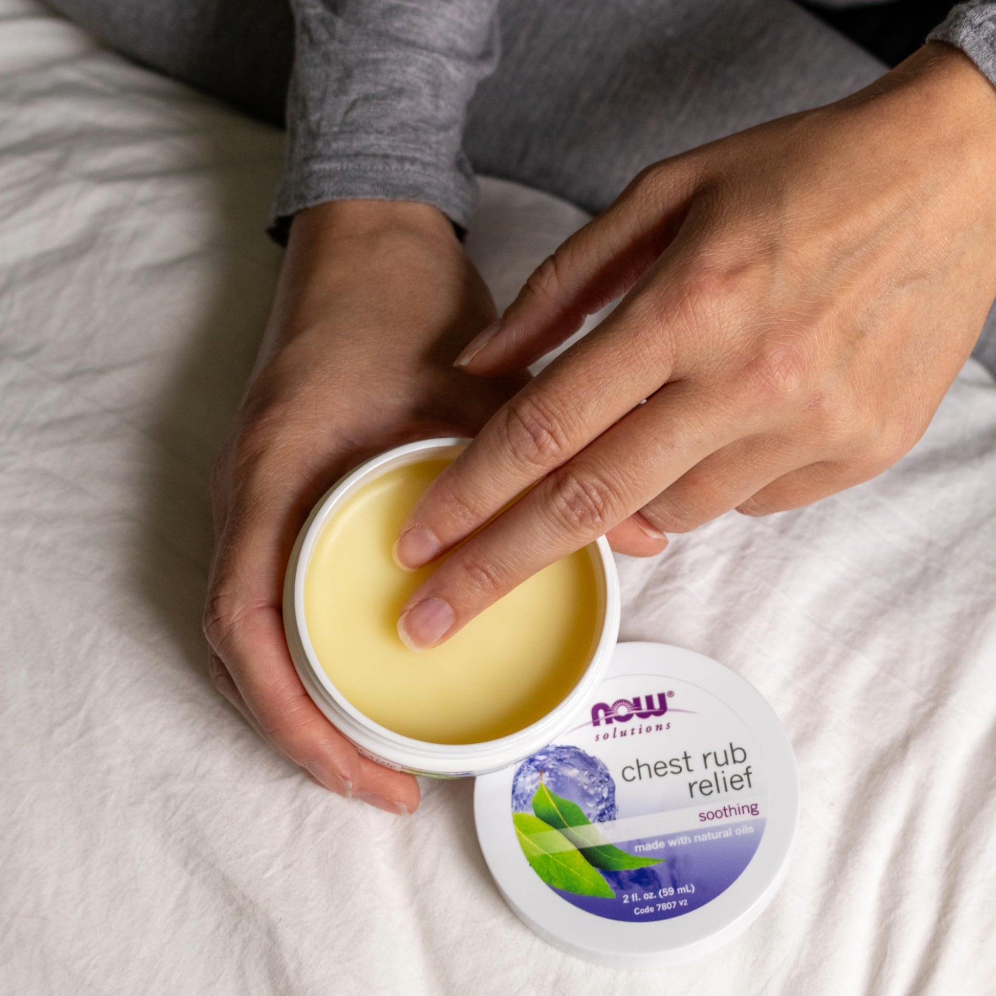 Open tin of Now Foods Chest Rub Relief ointment