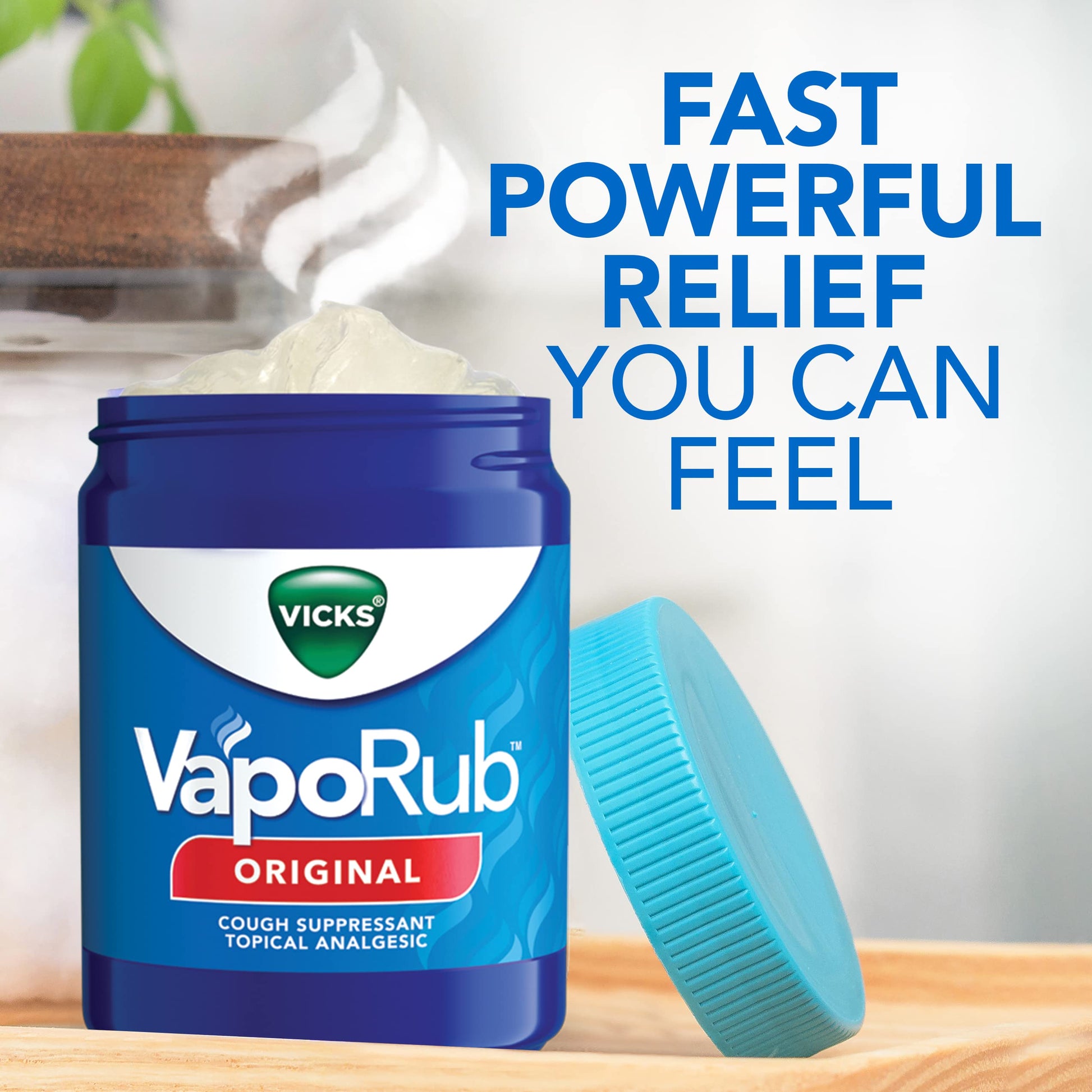 Close up of Vicks VapoRub ointment jar highlighting the brand logo and size specifications