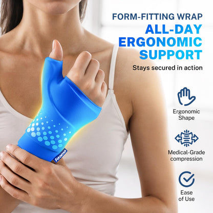 Person using Fitomo thumb and wrist ice pack while working at computer