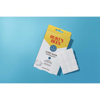 Burt's Bees Cold Sore Healing Patches twelve count pack displayed next to the natural origin rescue ointment.