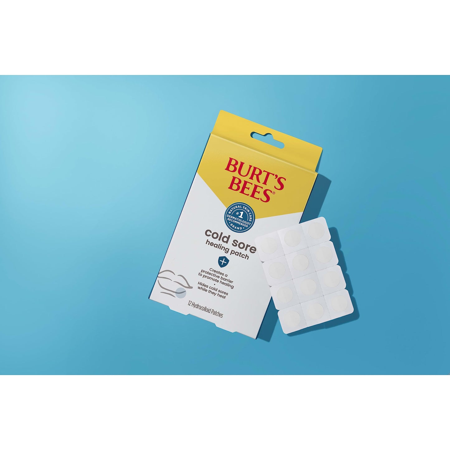 Burt's Bees Cold Sore Healing Patches twelve count pack displayed next to the natural origin rescue ointment.