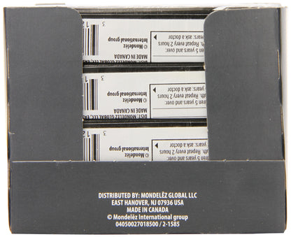 Close up of an individually wrapped extra strong cough lozenge for targeted pain relief.