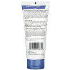 Lifestyle presentation of Nizoral scalp build-up remover bottle