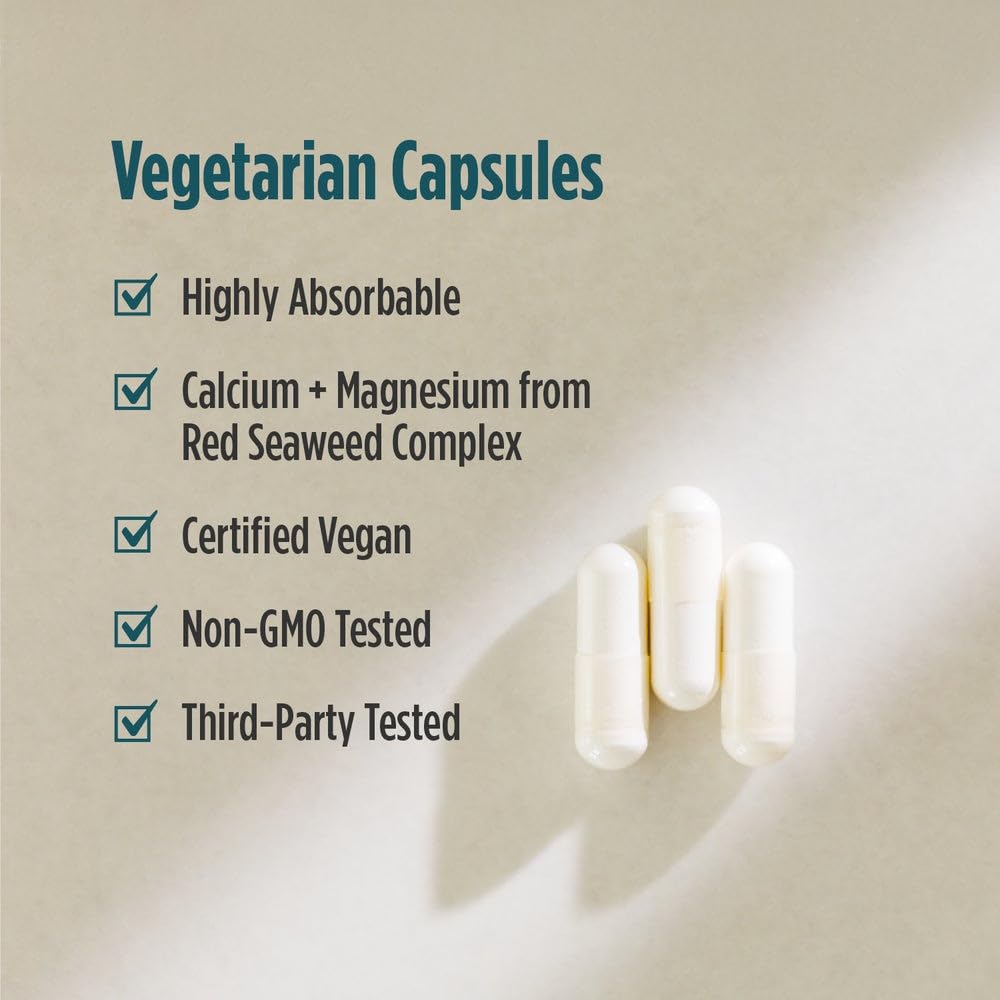 Close up of Nordic Naturals Multi Minerals unflavored capsules alongside its authentic imported packaging box