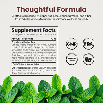 Natural respiratory syrup bottle displaying authentic Ayurvedic ingredients like Holy Basil and Ginger.