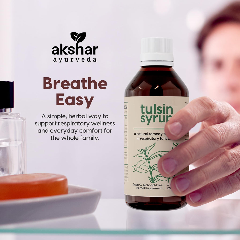 Liquid herbal cough syrup bottle placed on a clean background showing authentic USA import seal.