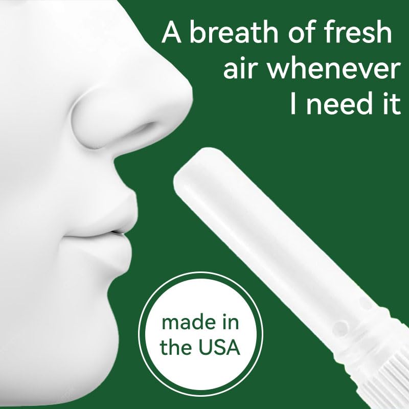 Close up of an individual Vamy inhalable energy amplifier stick being opened to demonstrate the portable twist off cap design.