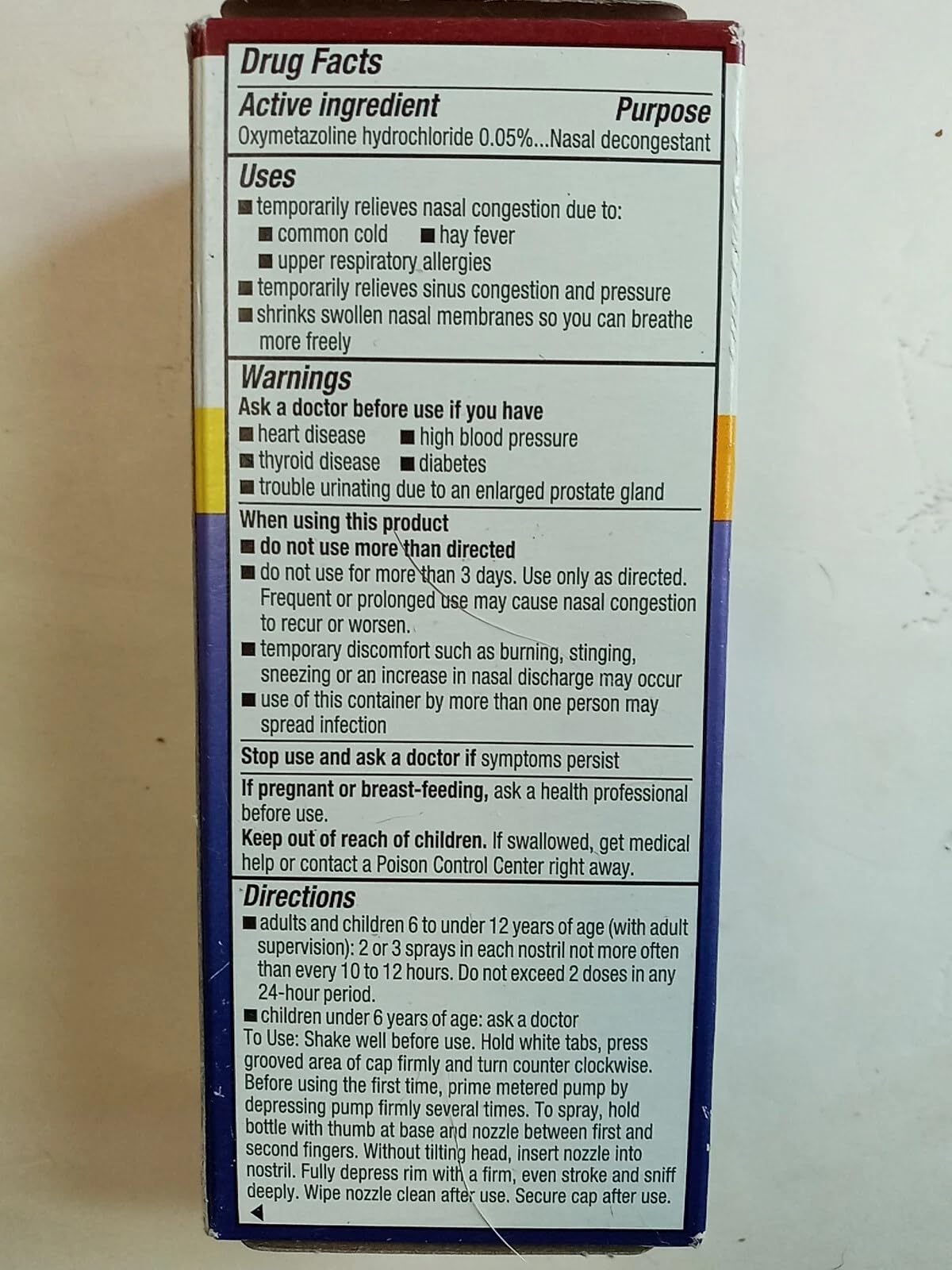 Afrin 15 mL moisturizing nasal spray packaging showing active ingredient details.