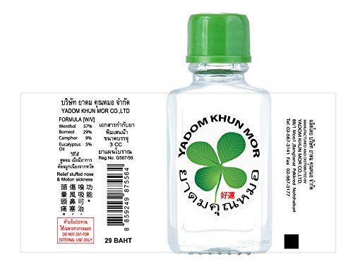 Authentic Thai herbal aromatherapy inhaler bottle for natural congestion relief close up view