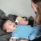 Side profile of Boogie baby care products demonstrating compact size for diaper bags.