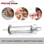 Complete Precise Canada ear wax removal syringe kit displayed on a flat surface.