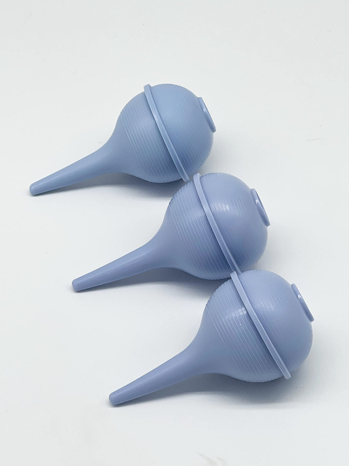 Medical Sales Supply medical bulb syringe demonstrating compression flexibility
