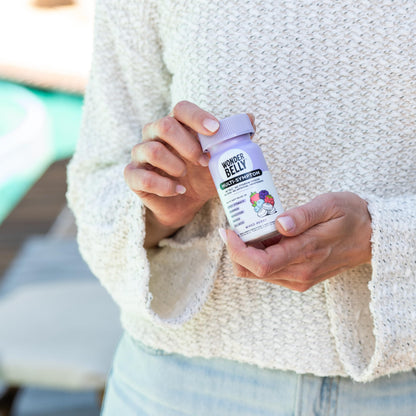 Wonderbelly multi symptom medicine recyclable bottle side panel with drug facts.