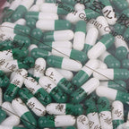 Pack of 1000 size 0 green and white gelatin capsules