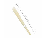 Handcrafted hollow beeswax ear candles arranged horizontally
