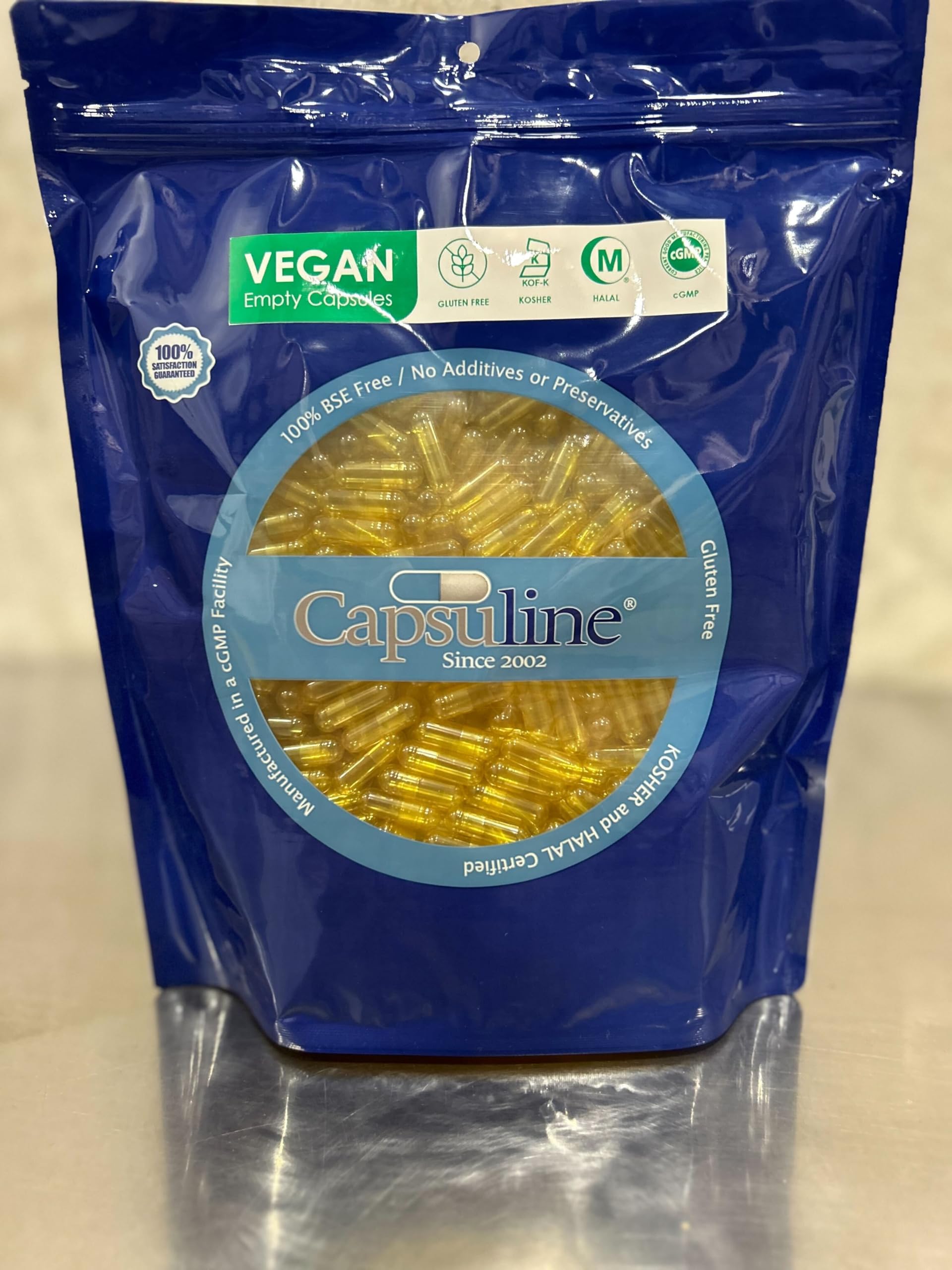Empty yellow capsules side by side for supplement making