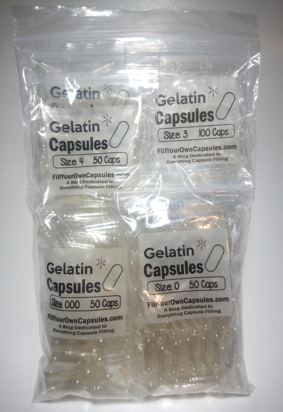 Clear gelatin pill shells in various sizes from 000 to 4 for DIY supplement filling.