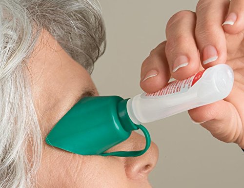 EasyComforts Eye Drop Guide attached to a bottle as an applicator aid