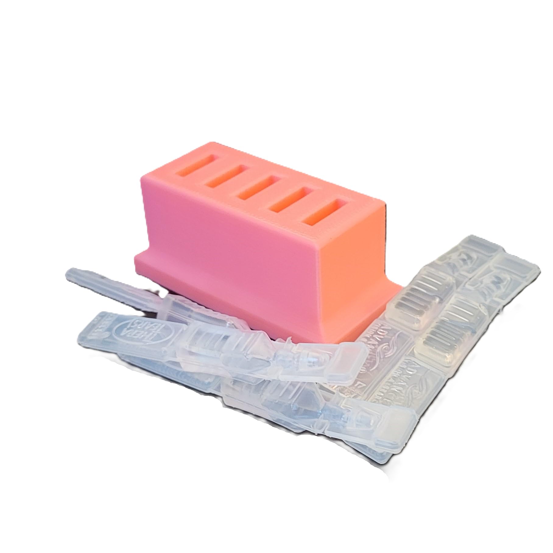 Pink 3D printed eye drop vial stand holding five disposable pipettes on a clean shelf
