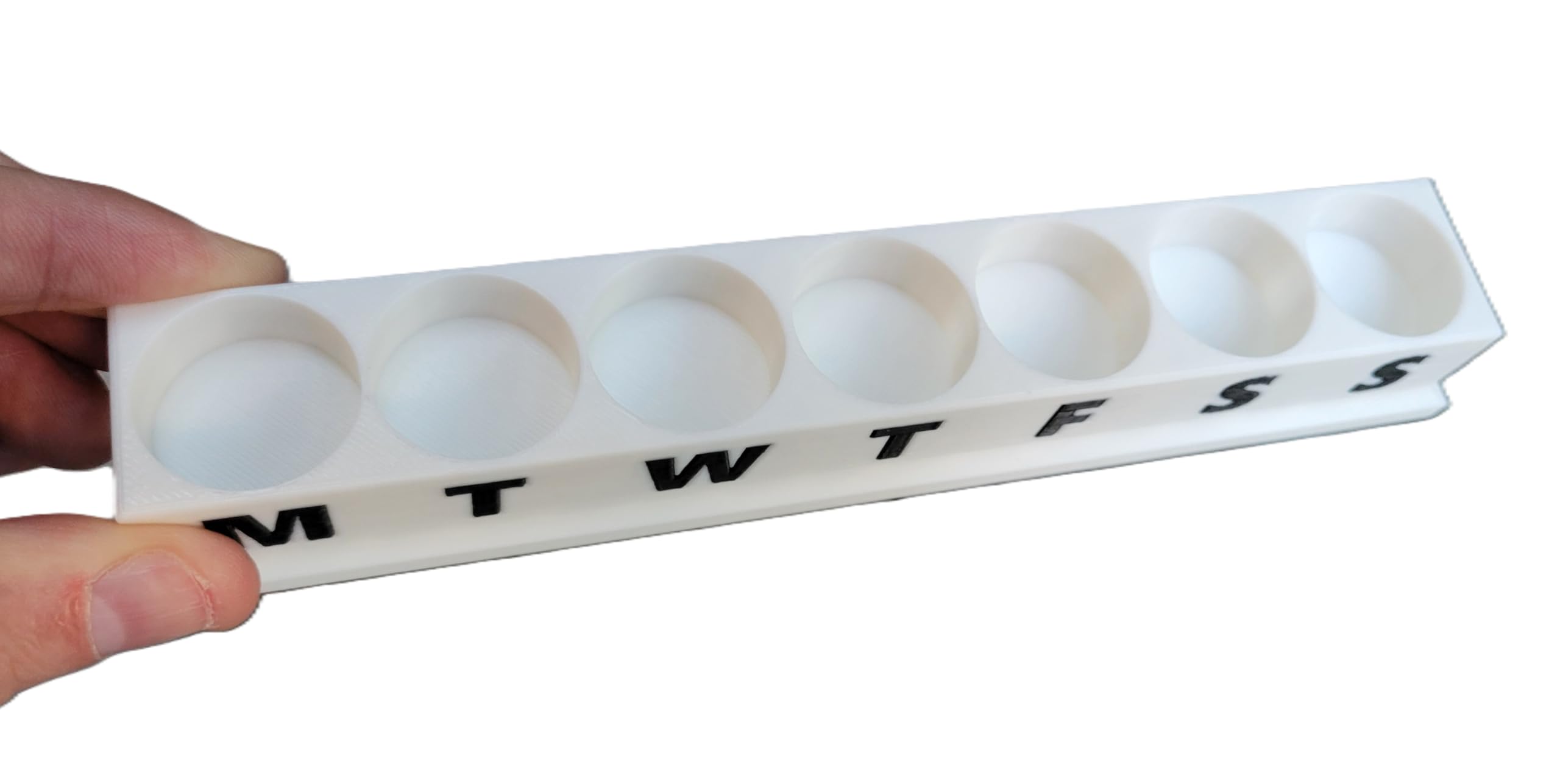 Znet3D eye drop storage tray placed on a neat white bathroom counter showing space saving design.