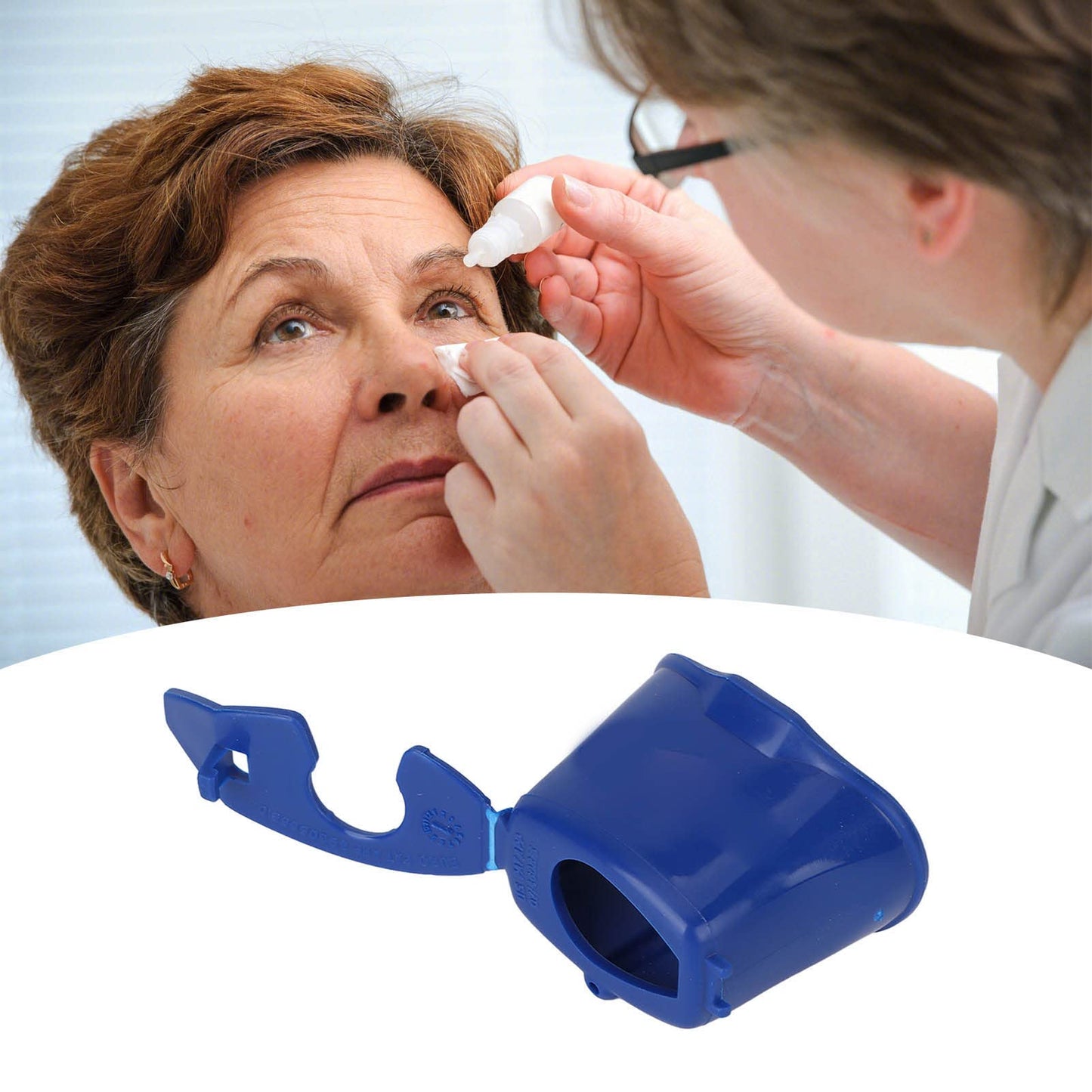 Dioche eye drop dispenser guide with a standard medicine bottle inserted into the universal adapter