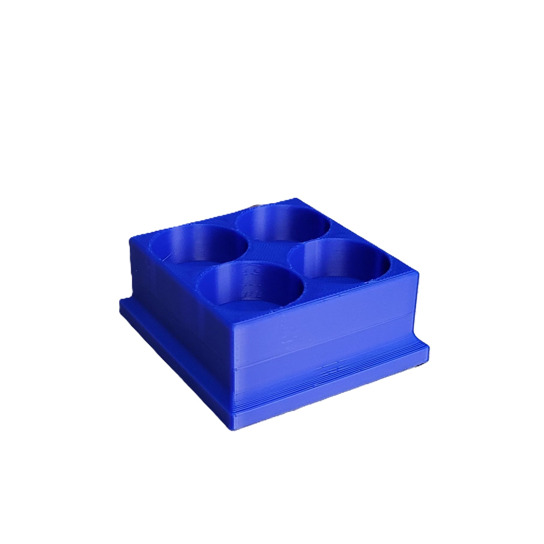 Blue plastic eye care bottle stand resting on a bathroom counter