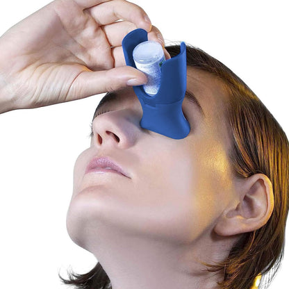 One handed eye drop helper tool demonstrating steady application technique