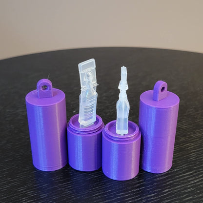 Pocket size eye drop container attached to a bag zipper
