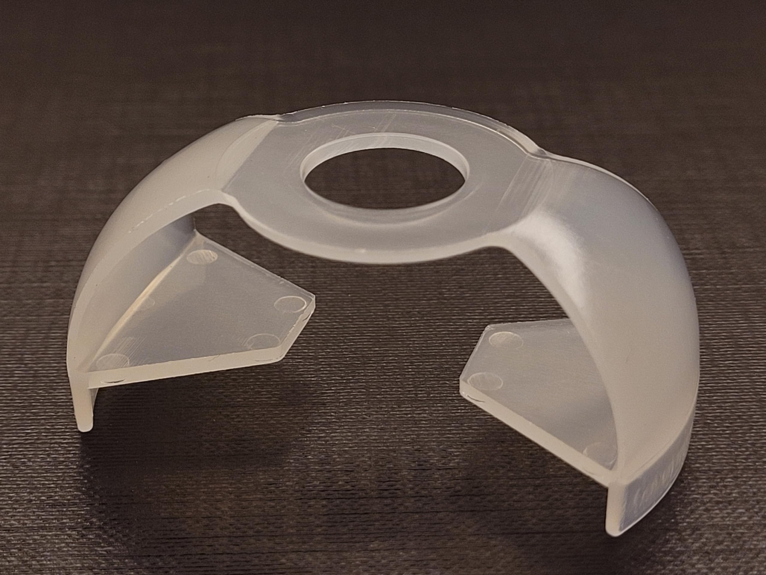 EZ Squeeze Eye Drop Bottle Dispenser attached to a medicine bottle demonstrating how the lever wings work