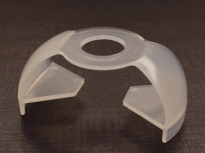 EZ Squeeze Eye Drop Bottle Dispenser attached to a medicine bottle demonstrating how the lever wings work