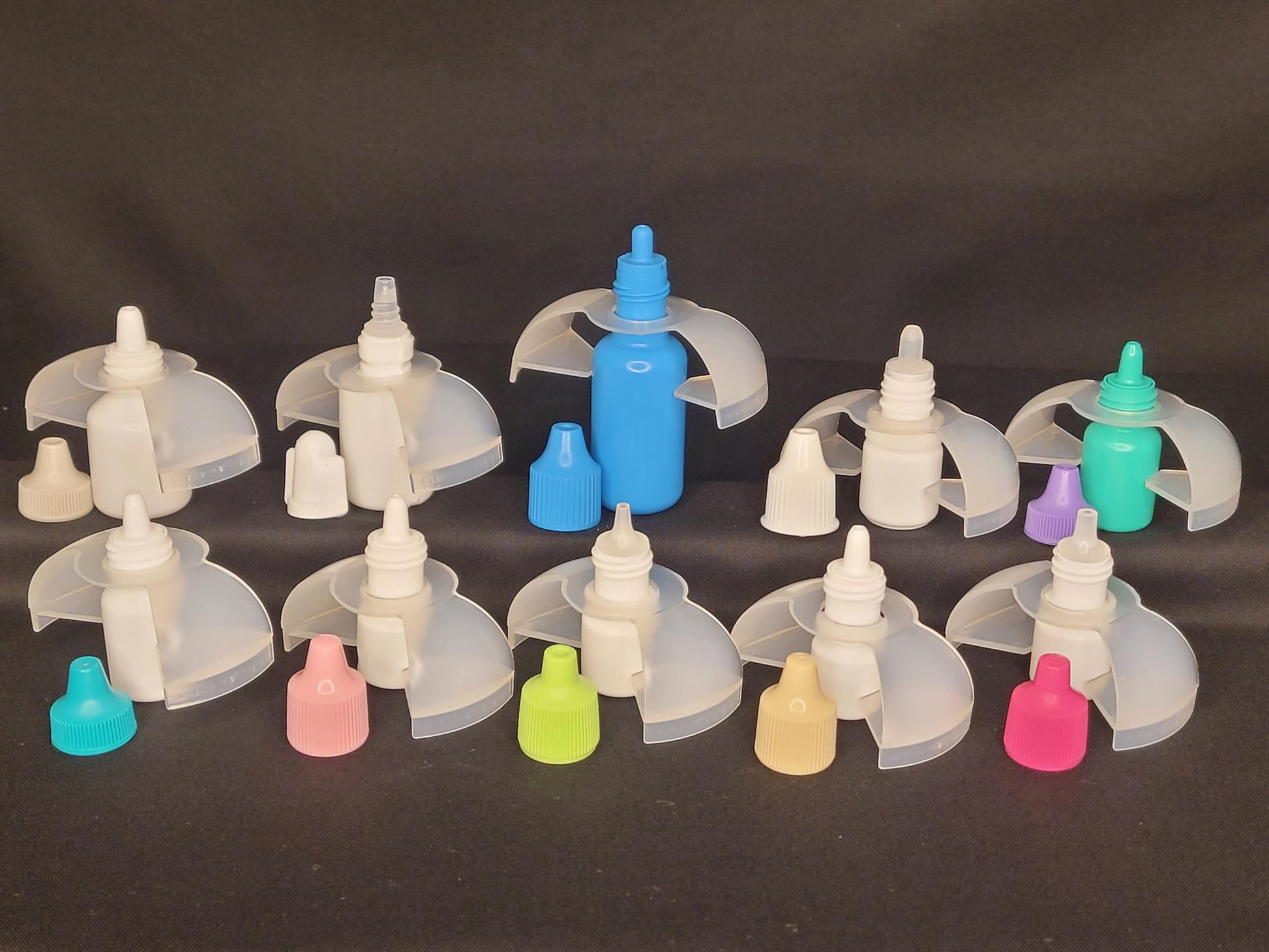 EZ Squeeze Eye Drop Dispenser being held by a senior user demonstrating easy alignment and grip