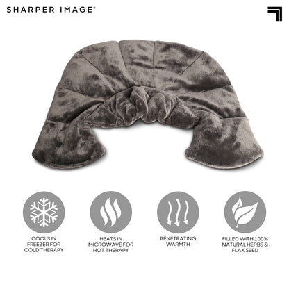 Sharper Image cooling and warming neck wrap being folded for easy travel storage