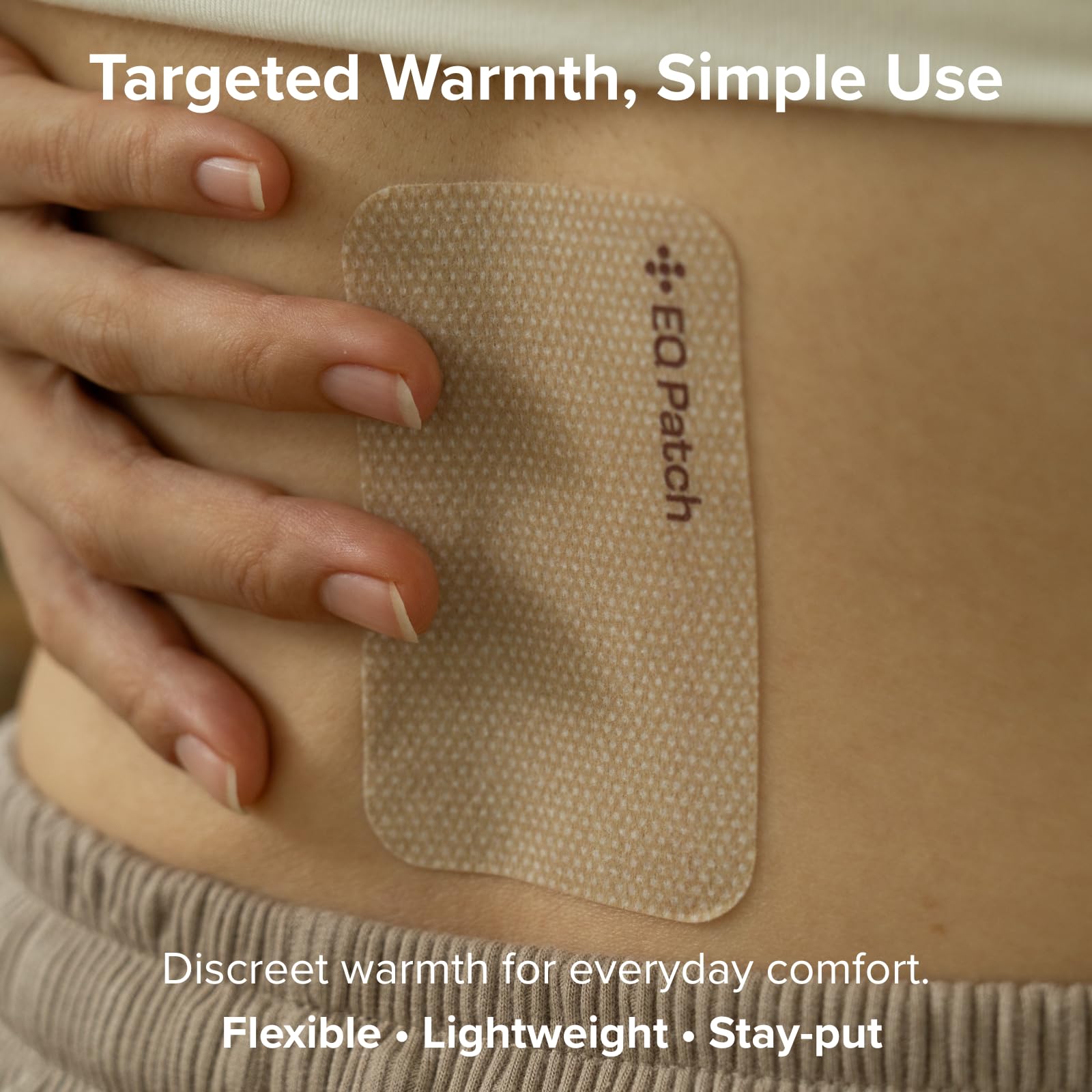 EQ Patch Infrared Warming Patches applied on a lower back demonstrating strong adhesive hold
