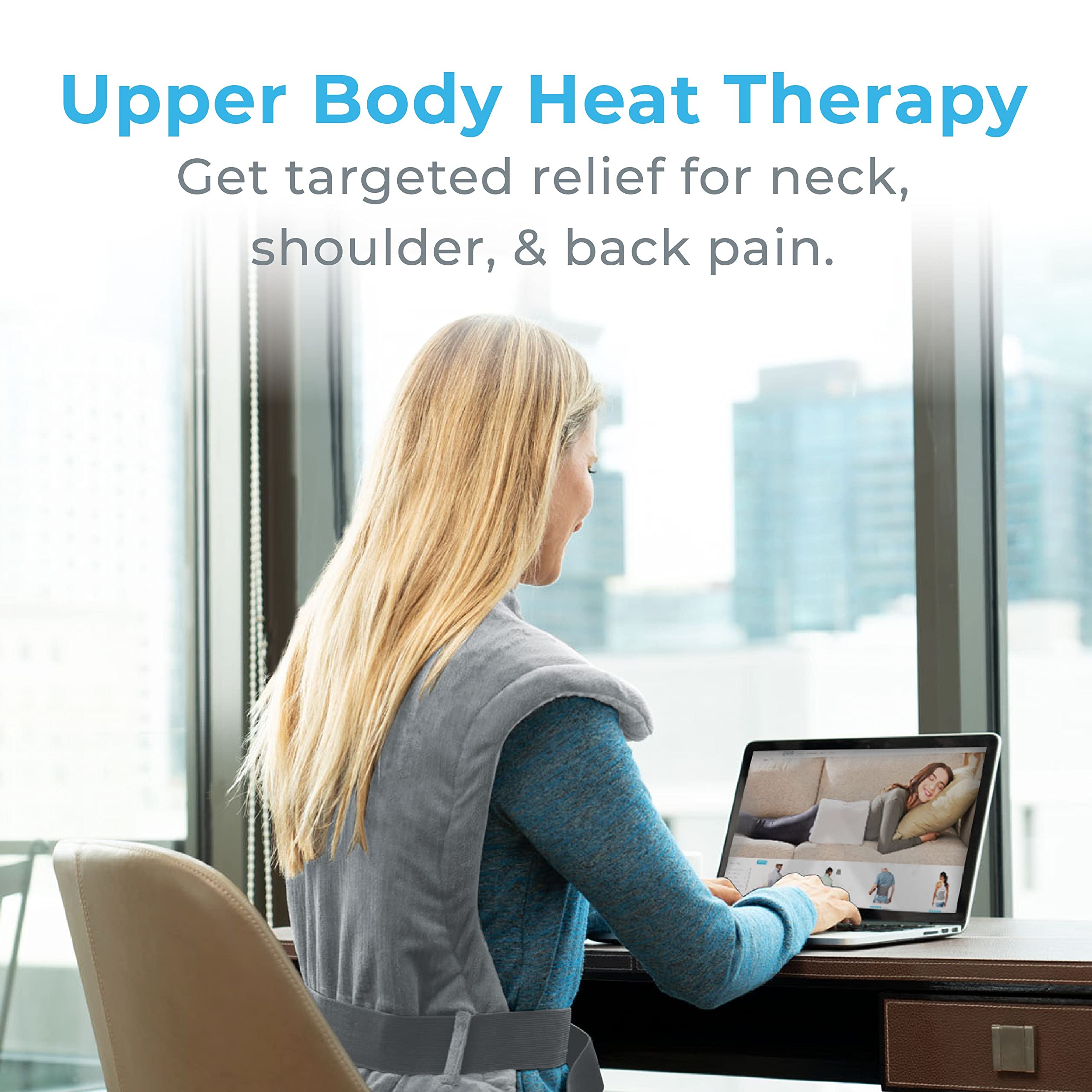 Pure Enrichment wearable electric thermal wrap secured around model shoulders with magnetic neck closure