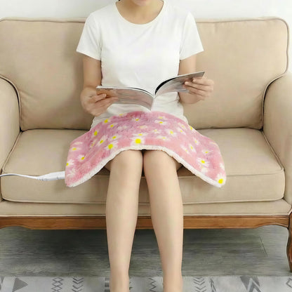 GOQO TOMO pink flower heat pad with the power cord detached, ready for machine washing care.
