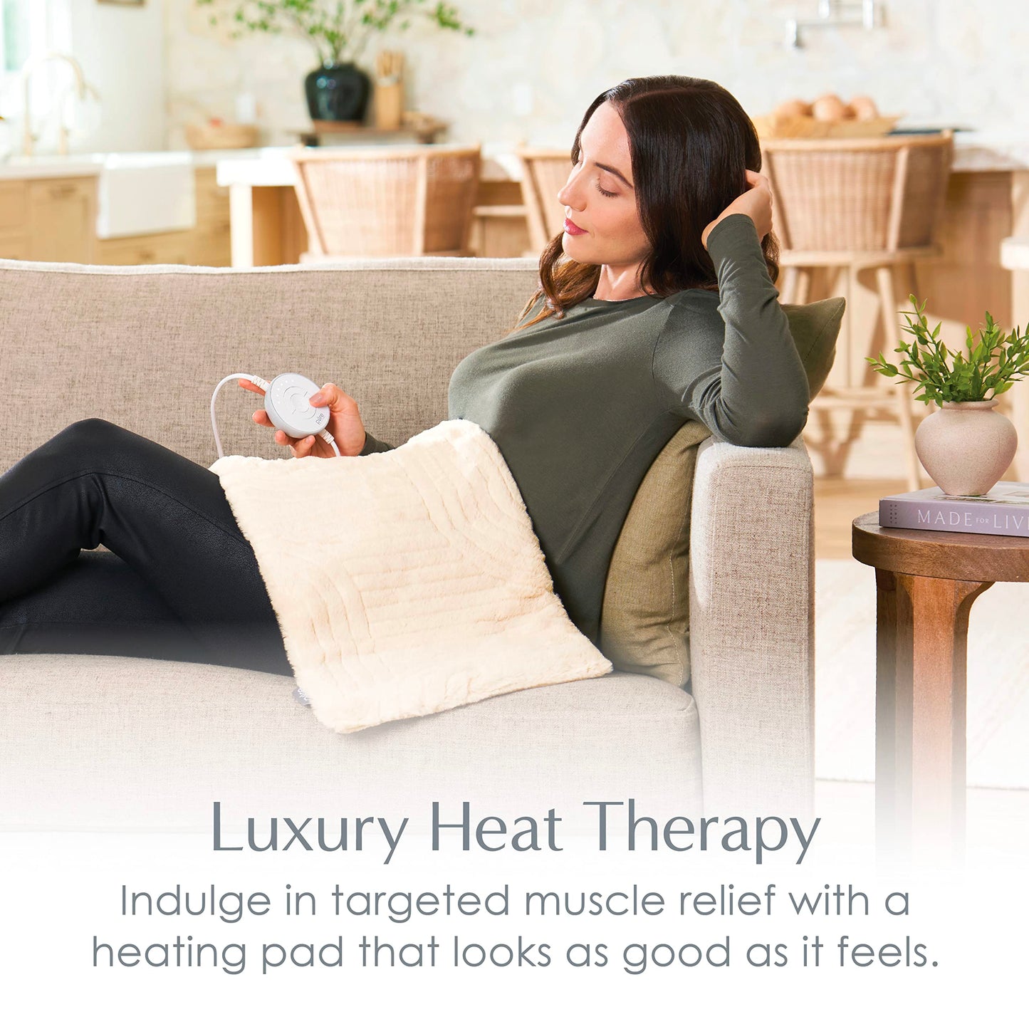 Pure Enrichment electric heating pad laid flat demonstrating the twelve by twenty four inch full coverage size.