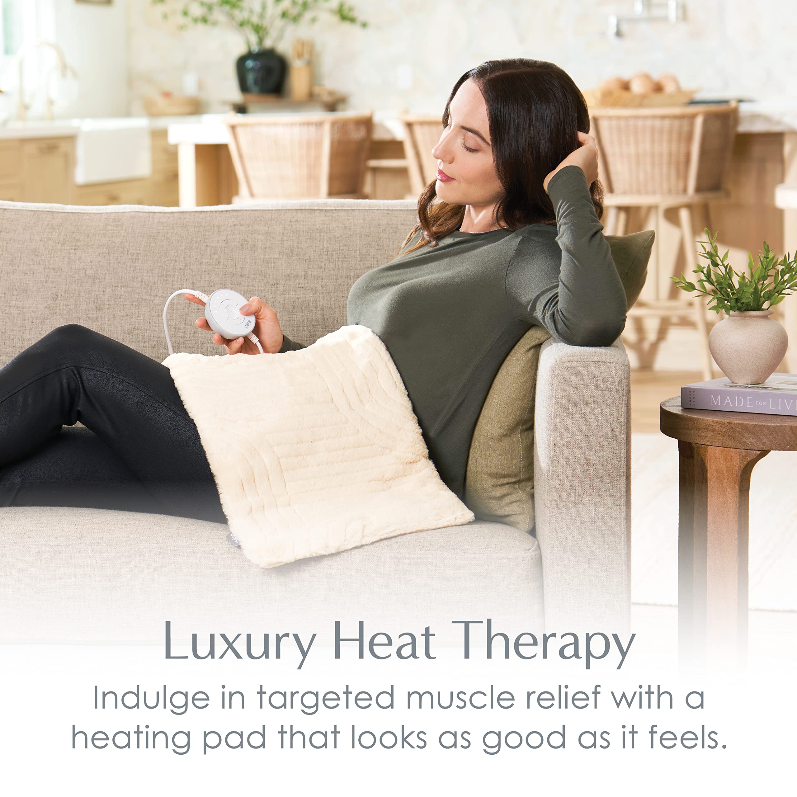 Pure Enrichment electric heating pad laid flat demonstrating the twelve by twenty four inch full coverage size.