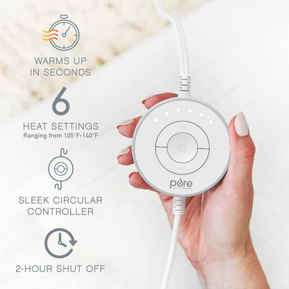 Ergonomic circular LED controller of the Pure Enrichment luxury heat wrap displaying the adjustable heat settings.