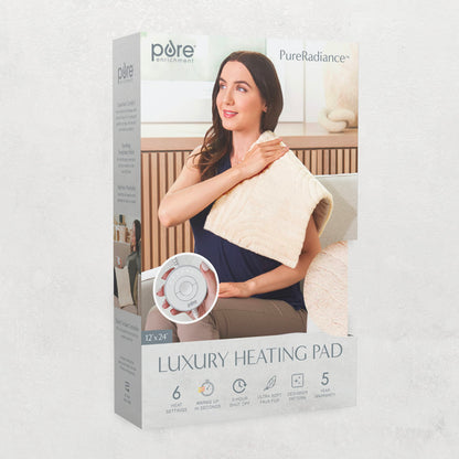 Pure Enrichment heating pad neatly folded inside its included matching storage bag for travel portability.