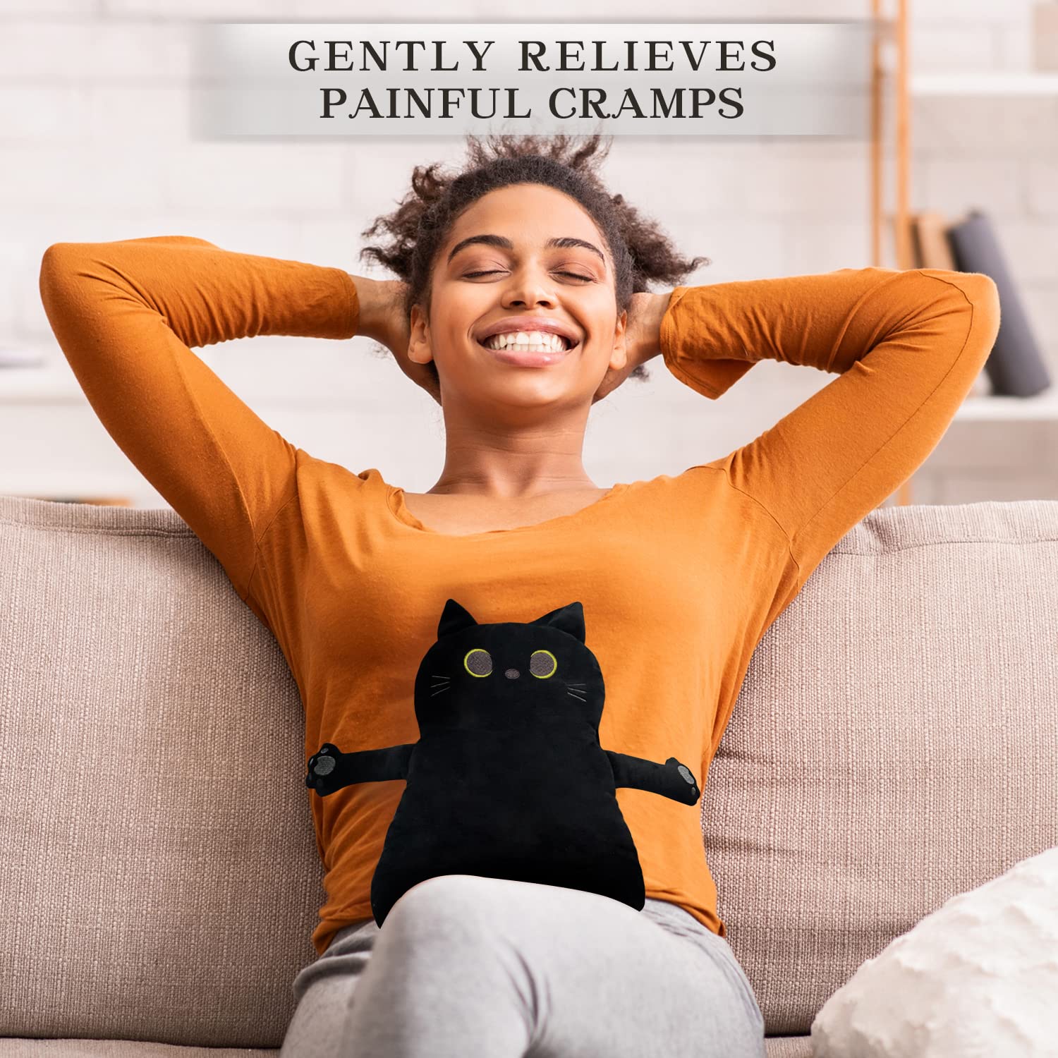 Cuckool plush kitten hot pack for cramps being placed inside a microwave