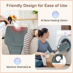 Hands free moist heat therapy pad being used comfortably on the shoulders and neck while sitting.