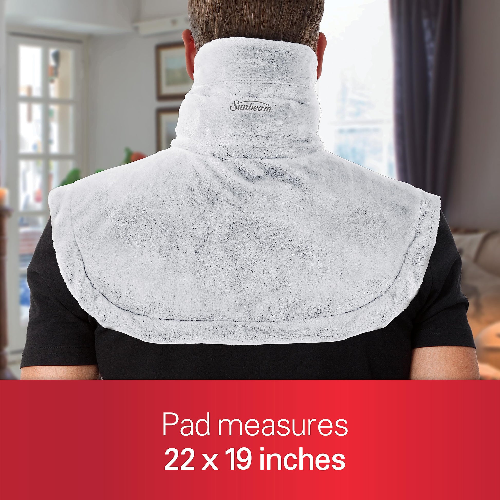 Close-up view of the plush grey machine-washable fabric on the Sunbeam contoured thermal pad.