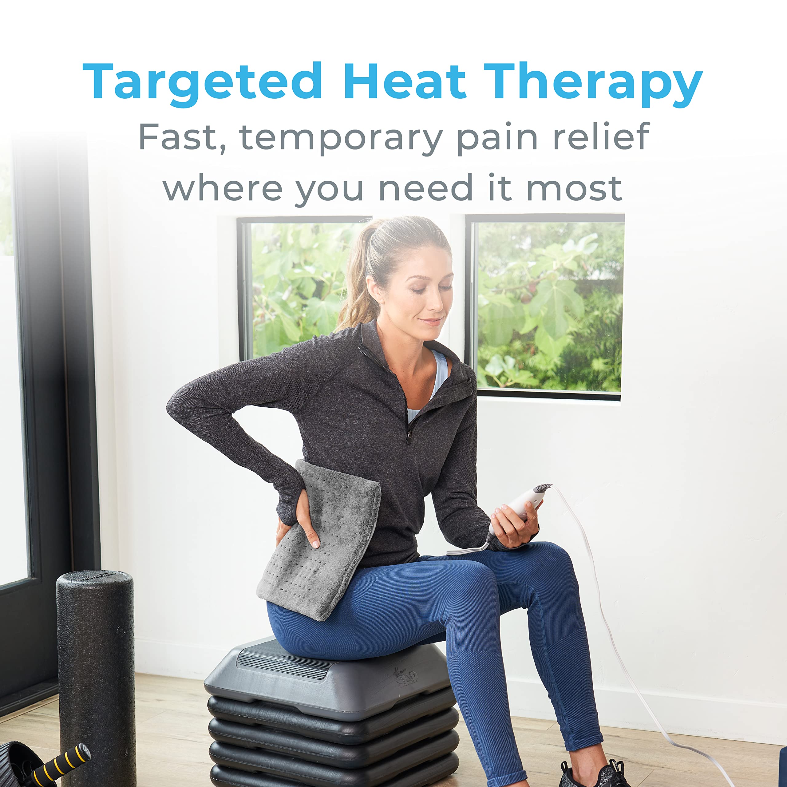 Pure Enrichment electric pad for back pain relief laid flat showing twelve by twenty four inch dimensions