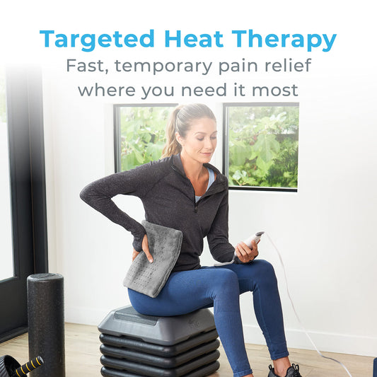 Pure Enrichment electric pad for back pain relief laid flat showing twelve by twenty four inch dimensions