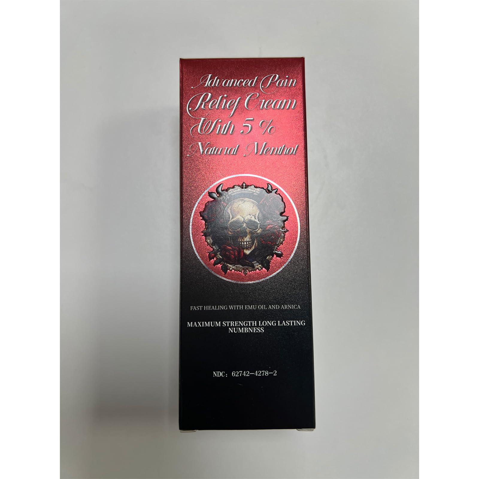 BlackCaves skin numbing cream long lasting formula with emu oil and arnica packaging.