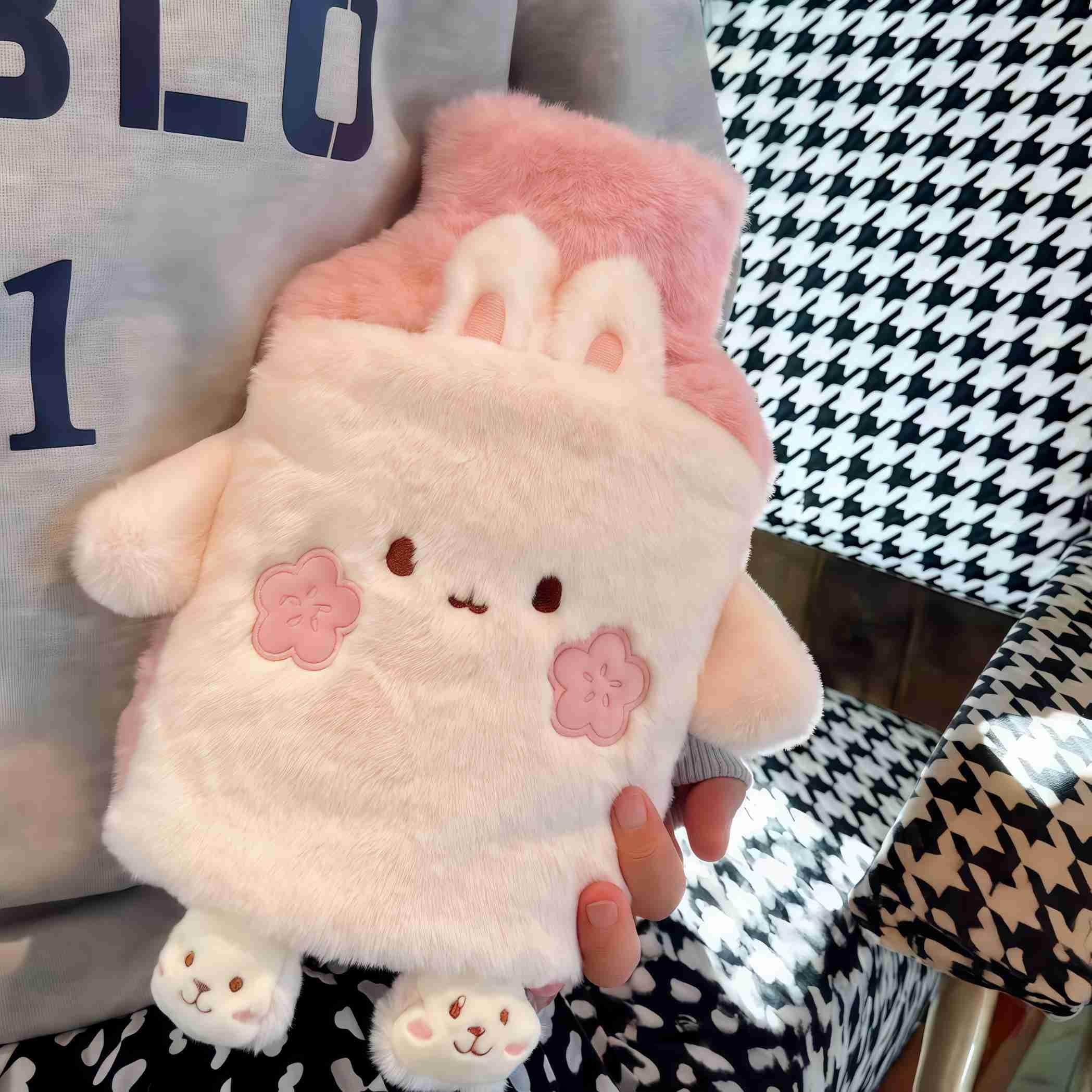 Winatehr rabbit hot water bottle packaging details and safety stopper closeup