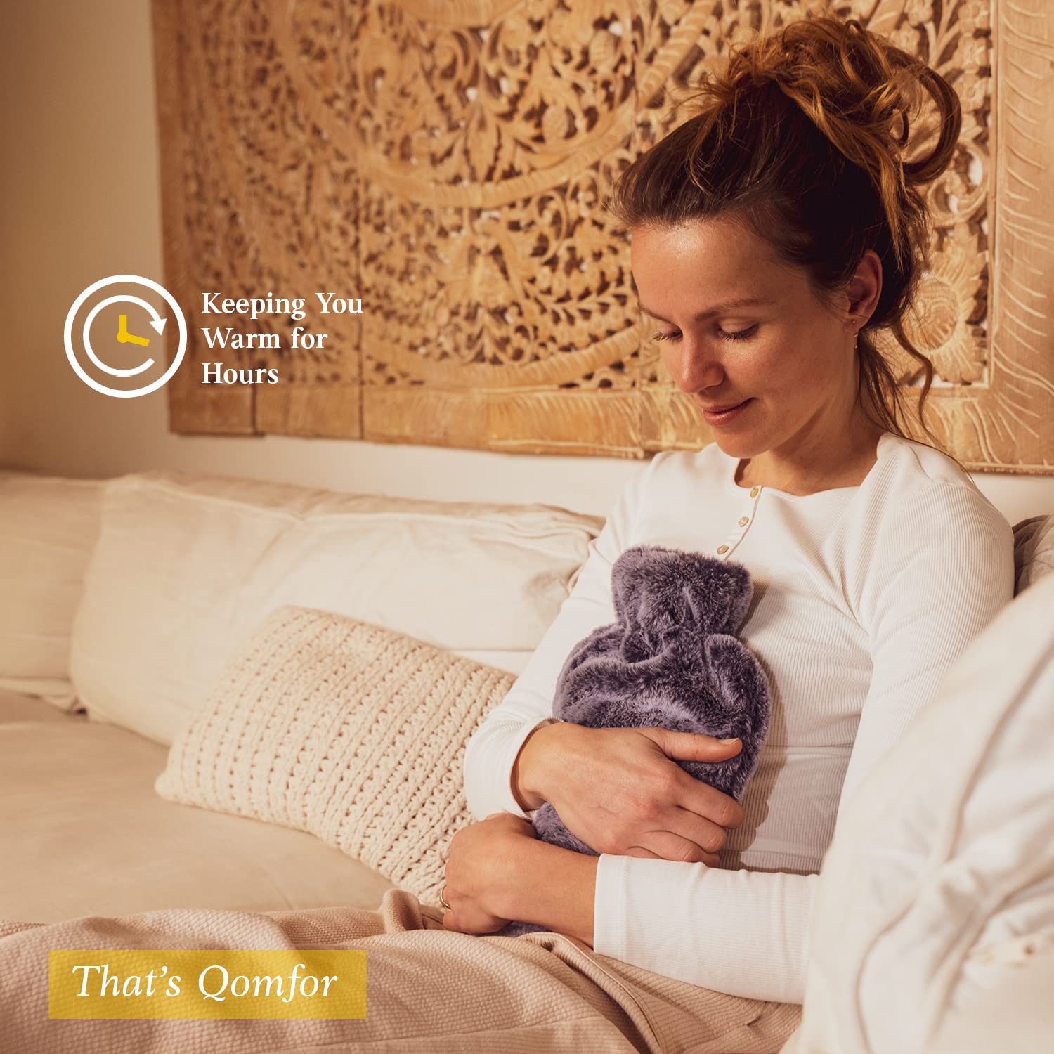 Qomfor large hot water bag used as a feet warmer in bed