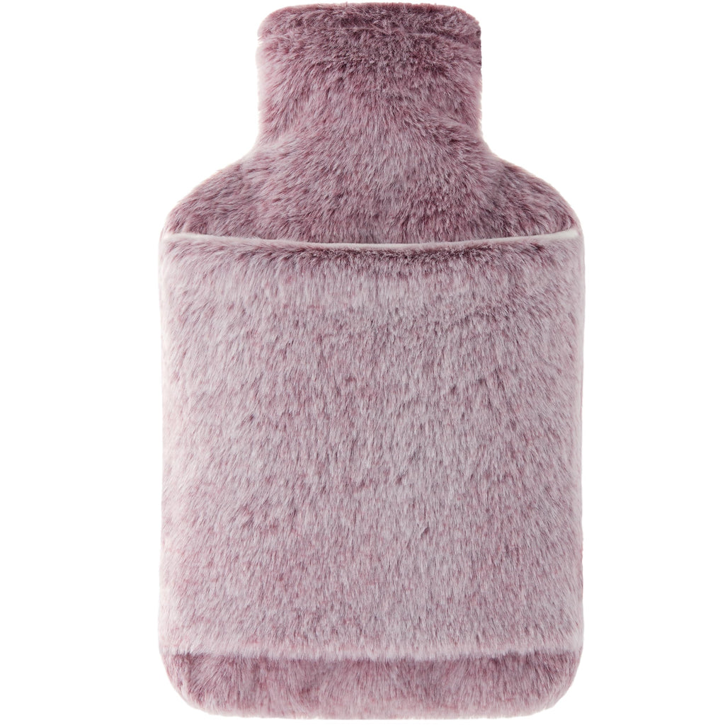 Samply hot water bottle with pink cover being used as a soothing hand and feet warmer.